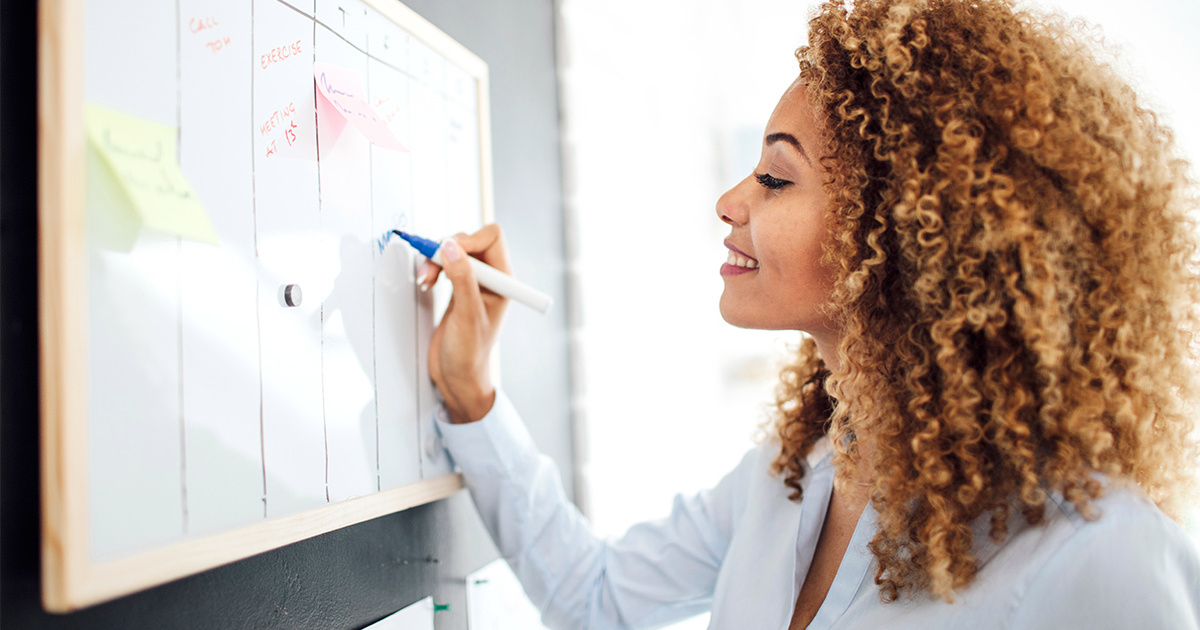 Woman with cleaning do to list to improve her air quality. 